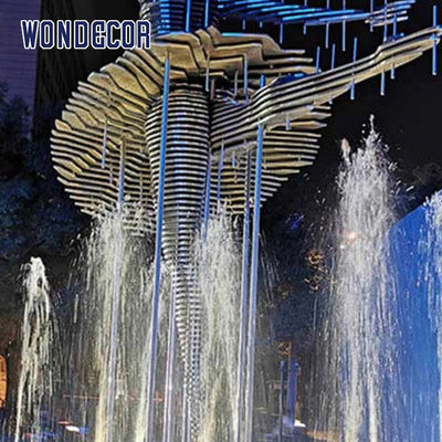 Large stainless steel character shaped outdoor sculpture in the park